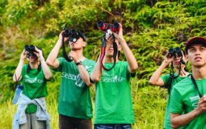 The group members eagerly searched for the red-shanked douc langur.